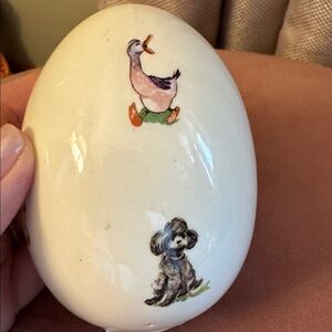 White Ceramic Egg Figurine with Duck Motif